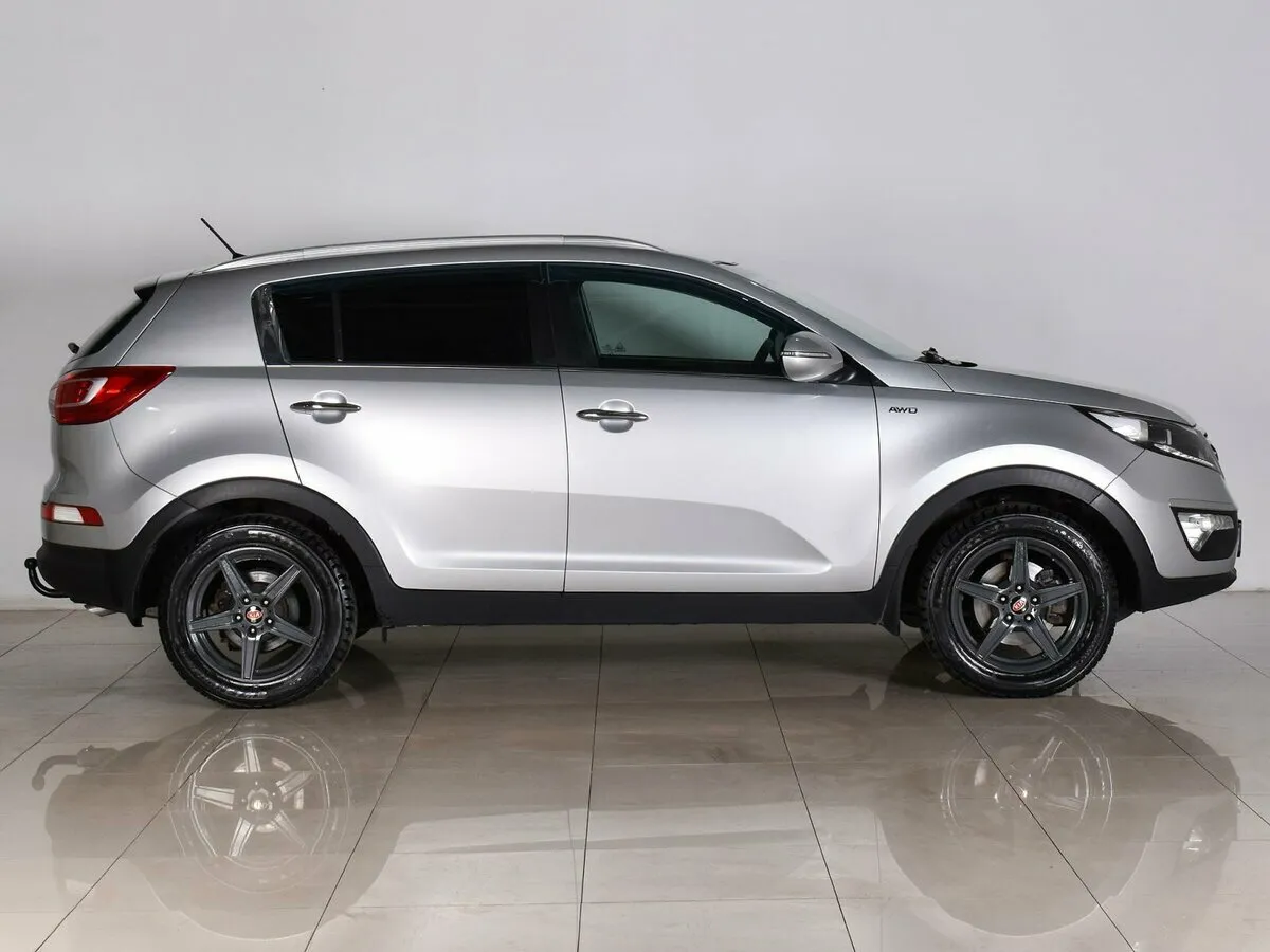 Kia Sportage III — фото 5