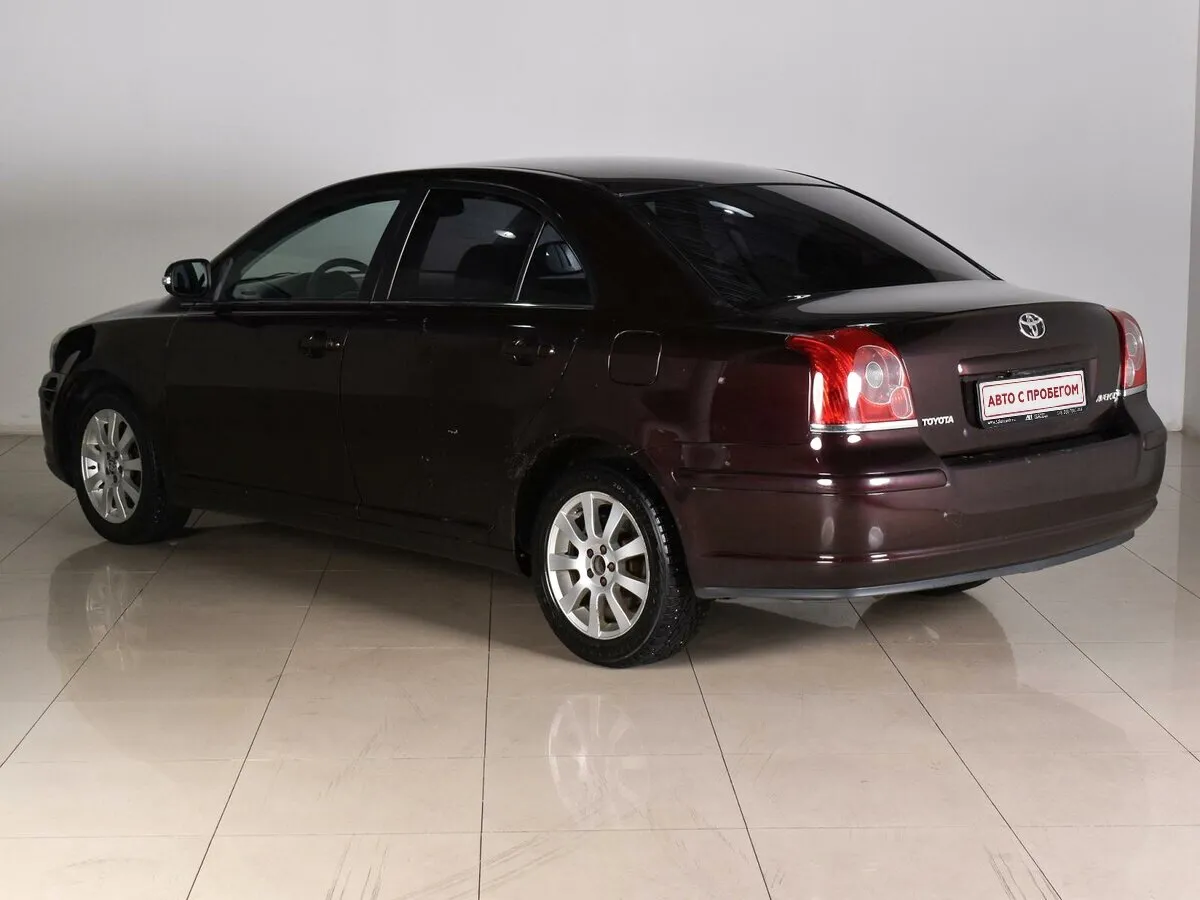 Toyota Avensis II Рестайлинг · Сол — фото 3