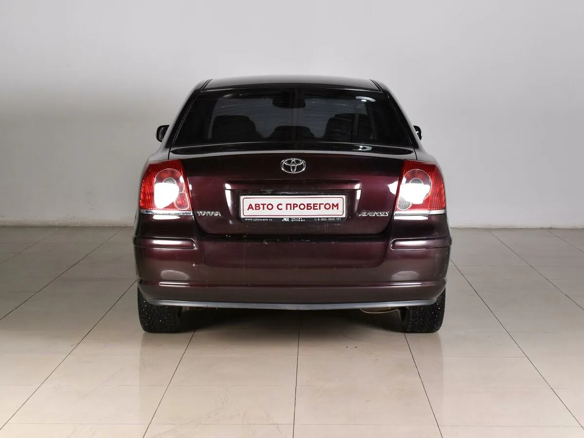 Toyota Avensis II Рестайлинг · Сол — фото 4