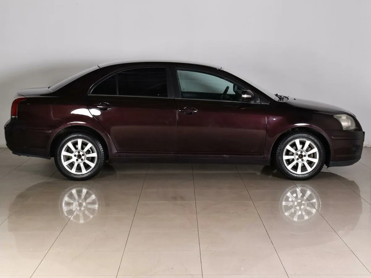 Toyota Avensis II Рестайлинг · Сол — фото 5