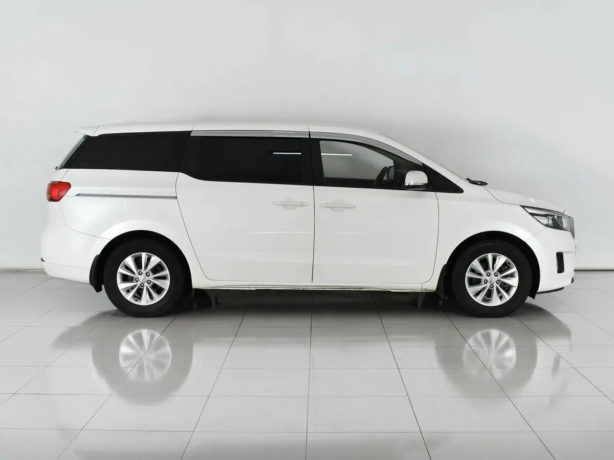 Kia Carnival III — фото 5