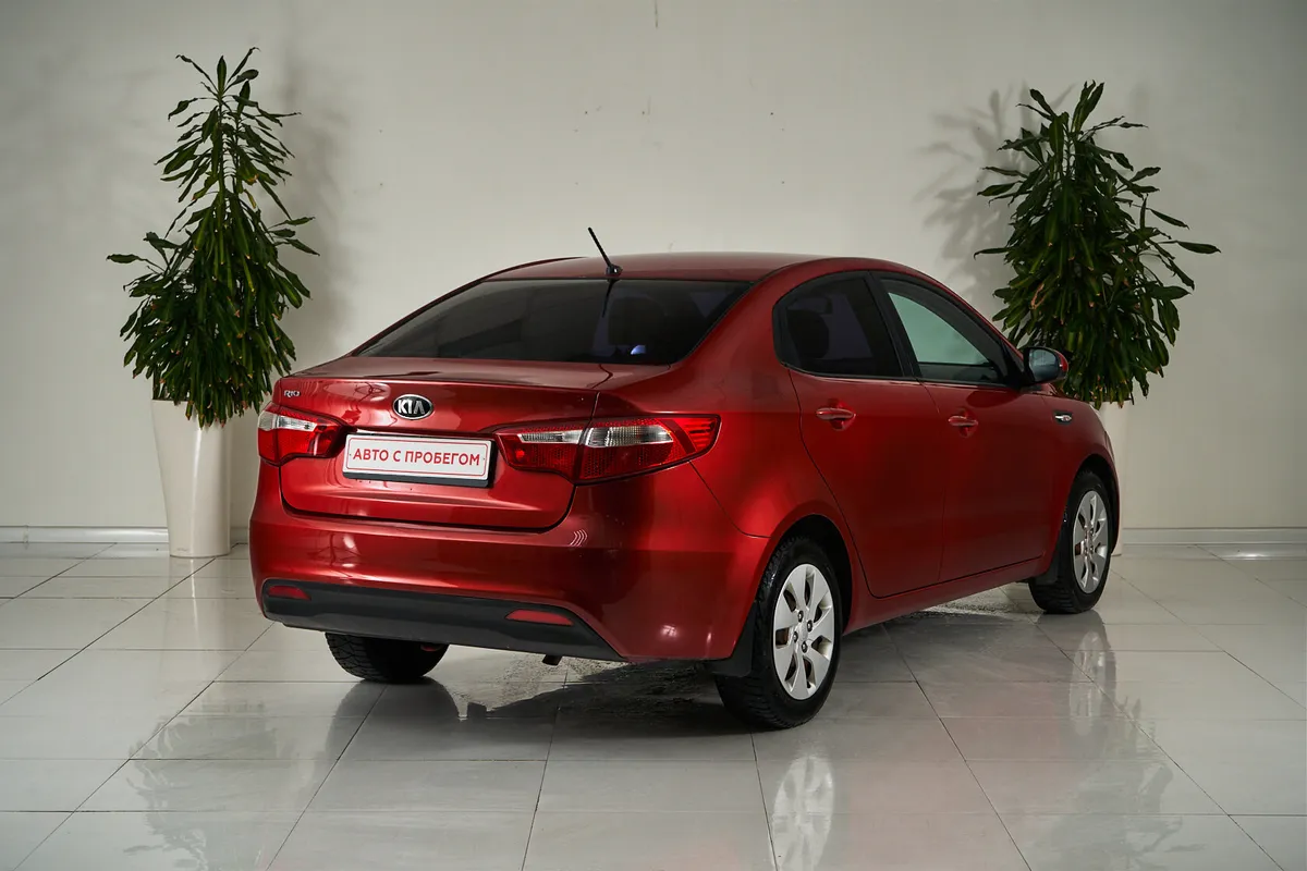 Kia Rio III — фото 5