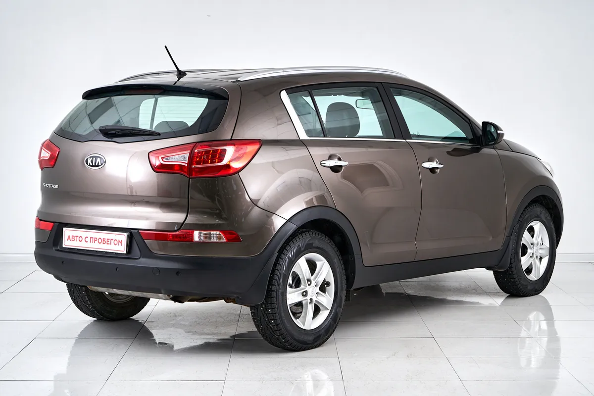 Kia Sportage III — фото 5