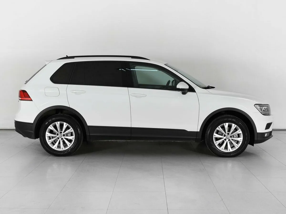 Volkswagen Tiguan II · Highline — фото 4
