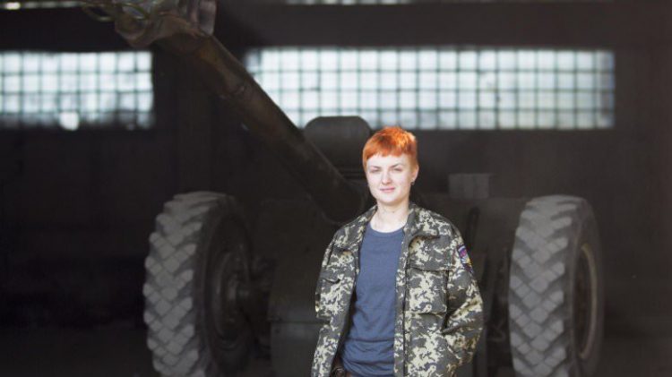 A-pro-Russian-rebel-poses-during-an-interview-in-the-town-of-Makievka