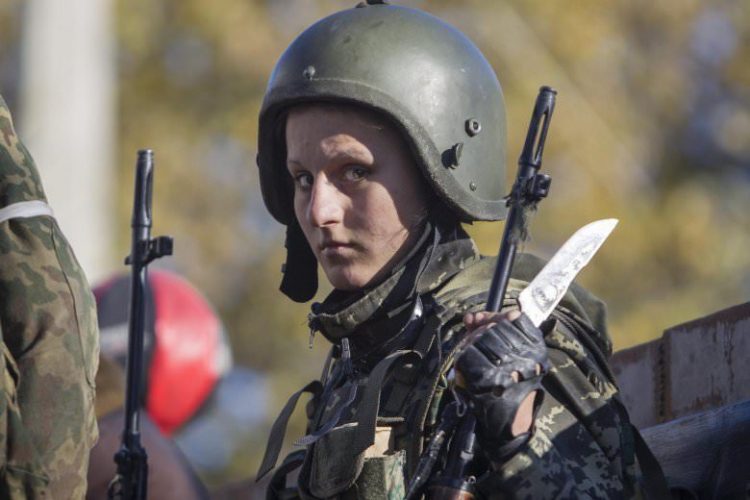 A-pro-Russian-rebel-stands-on-a-truck-in-the-town-of-Donetsk