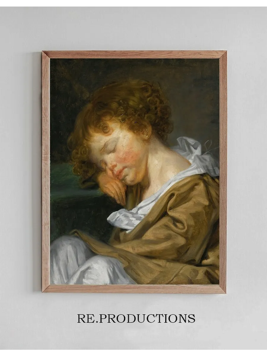 A Boy Asleep On A Table