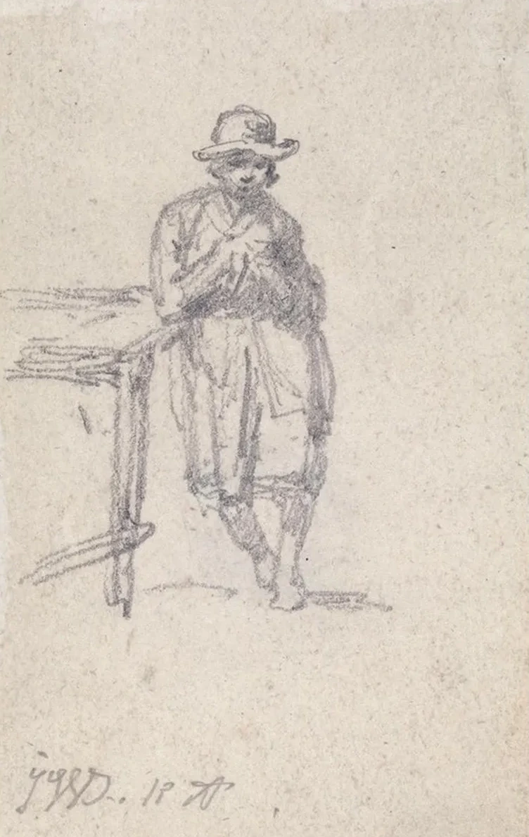 A Boy Leaning against a Table