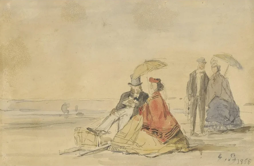 A Couple Seated and a Couple Walking on the Beach