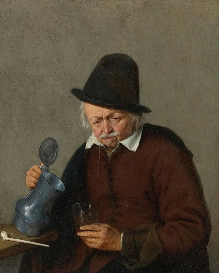 A Man Holding A Tankard And A Glass