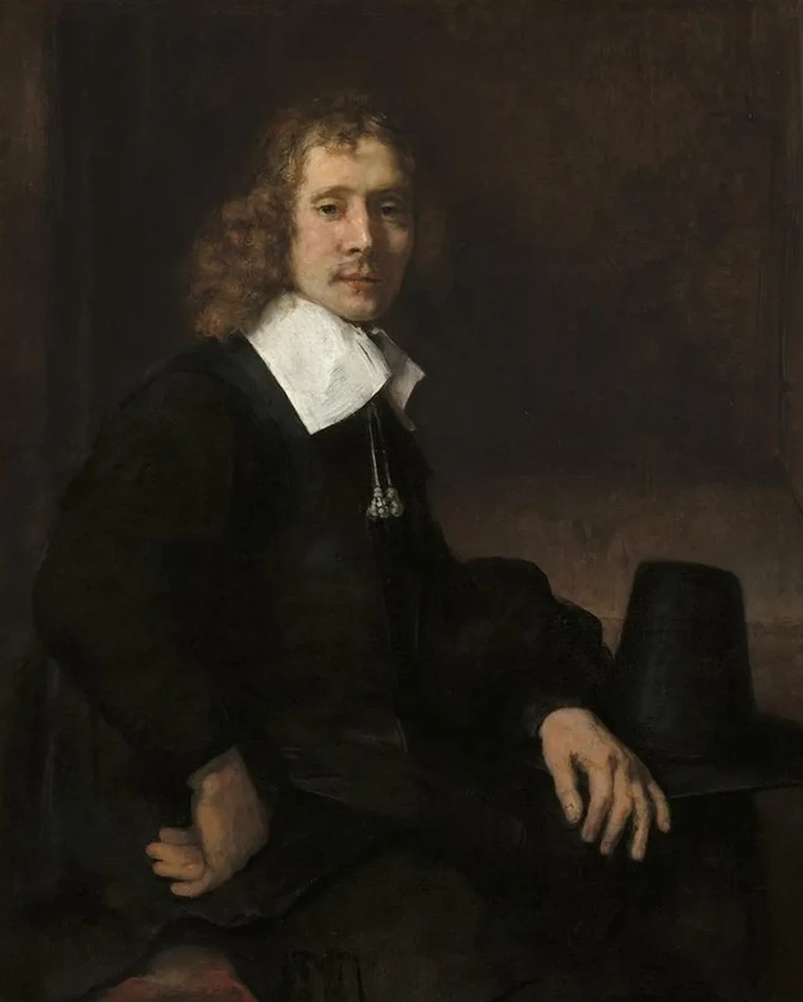 A Young Man Seated at a Table (possibly Govaert Flinck)