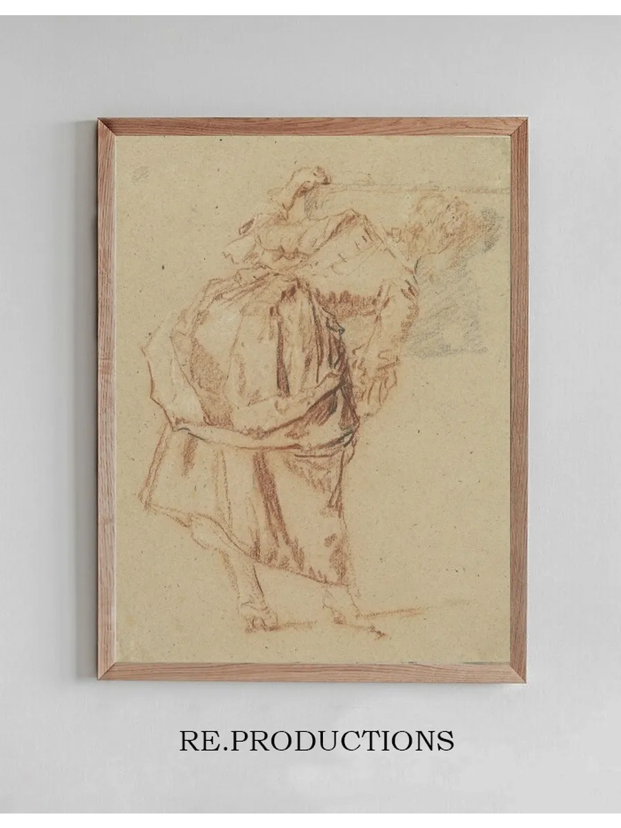 A Young Woman Looking in a Mirror