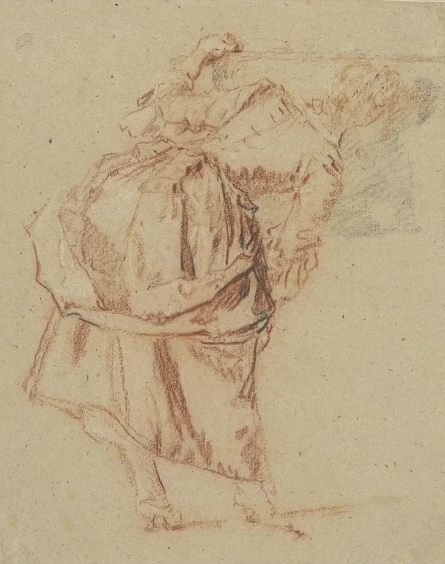 A Young Woman Looking in a Mirror