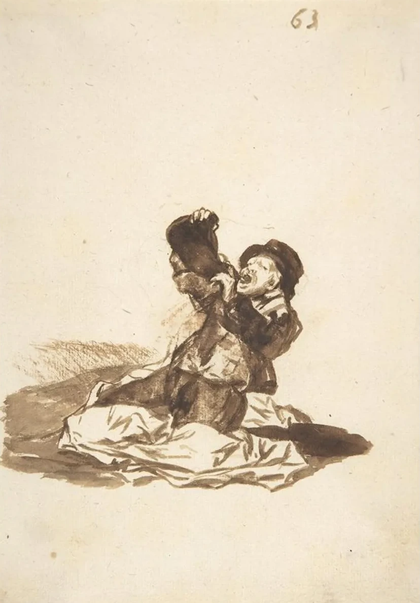 A Man on the Ground Drinking from a Wine Skin