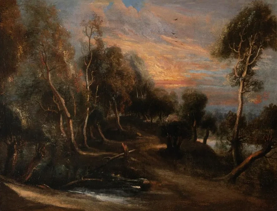 A Wooded Landscape at Sunset