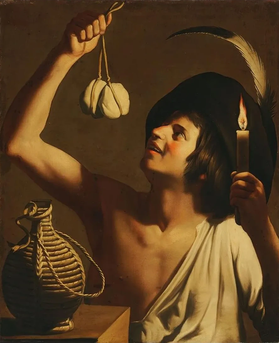A Young Man Holding a Burning Candle and a Scamorza Cheese, a Fiasco Bottle Beside Him