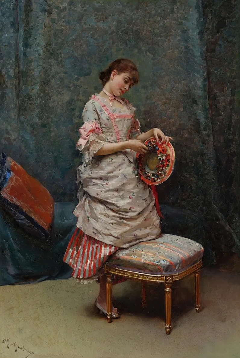 Aline Holding a Hat