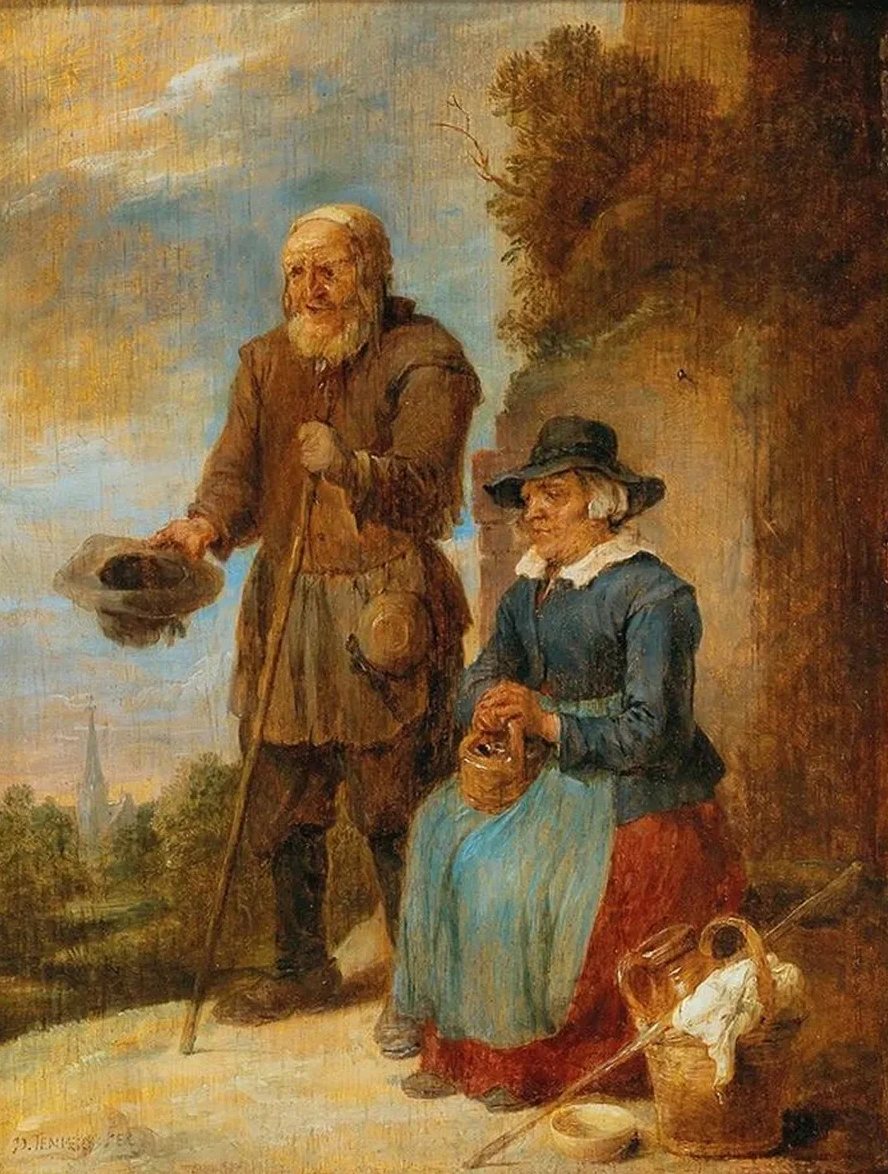 An Old Couple Begging On The Street