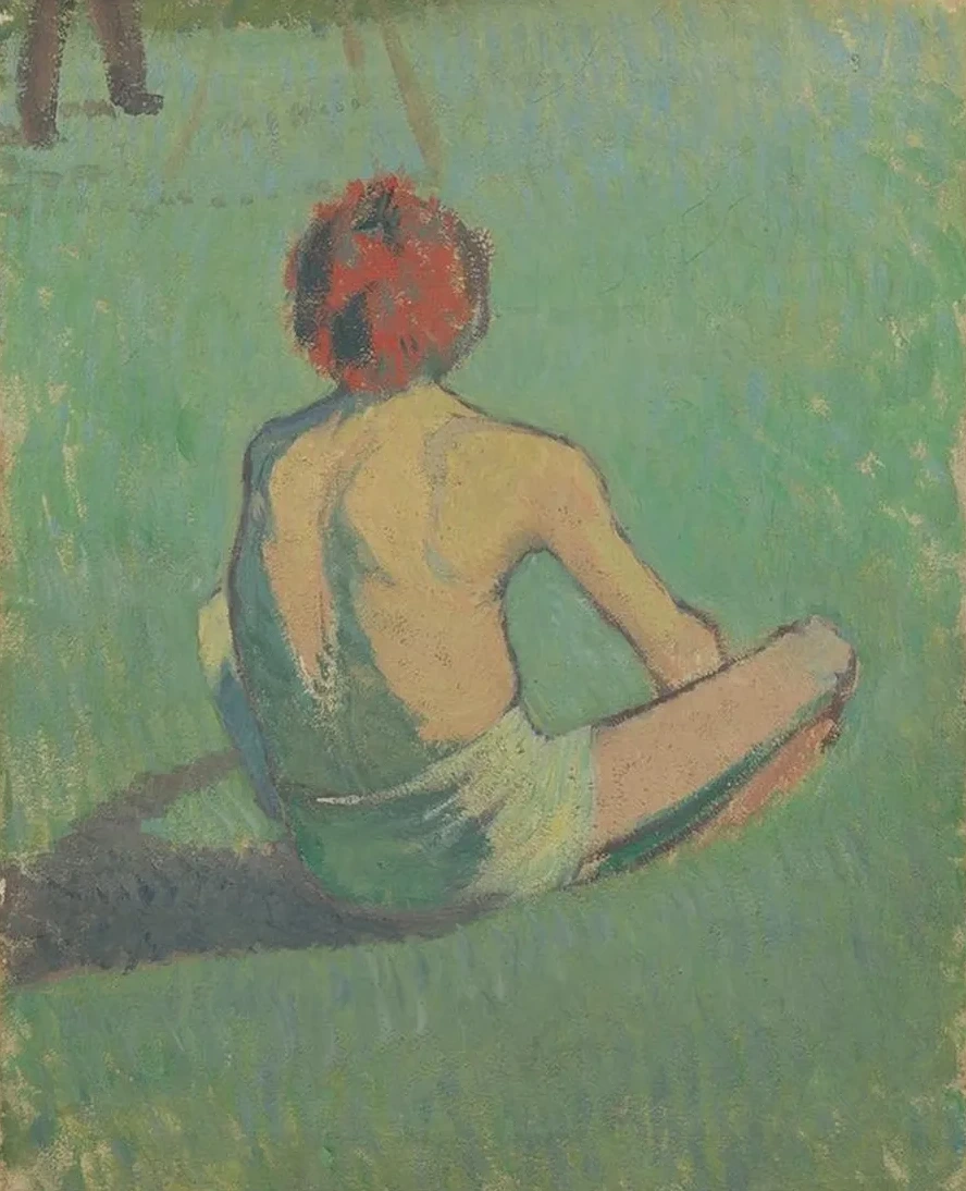 Boy Sitting in the Grass