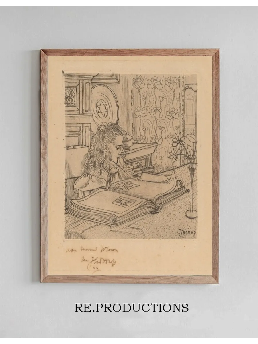 Charley Looking at an Album of Prints