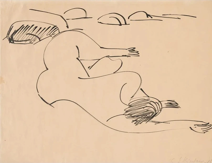 Erna Lying on the Beach among Rocks