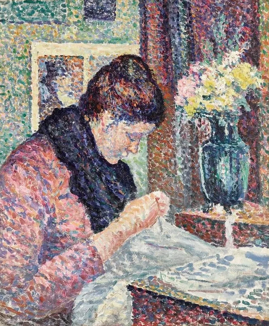 Femme Cousant