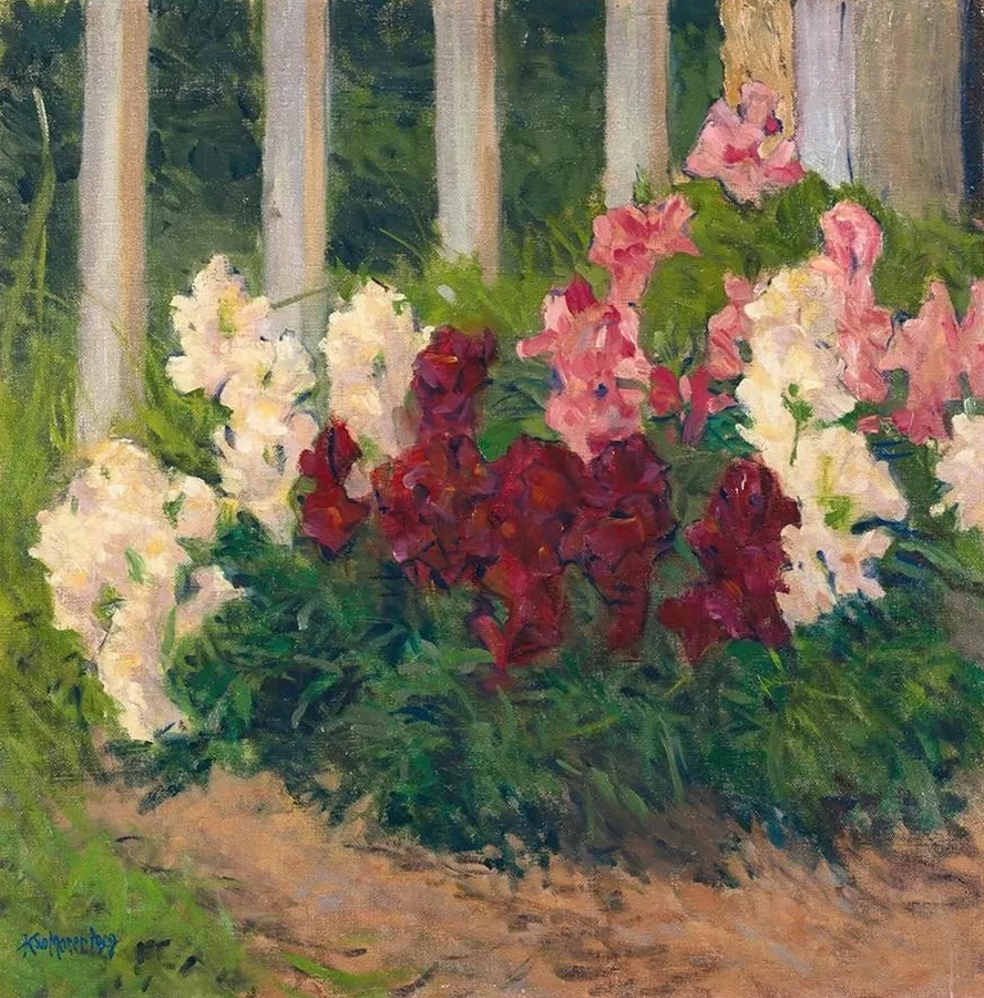 Flowers Before A Garden Fence
