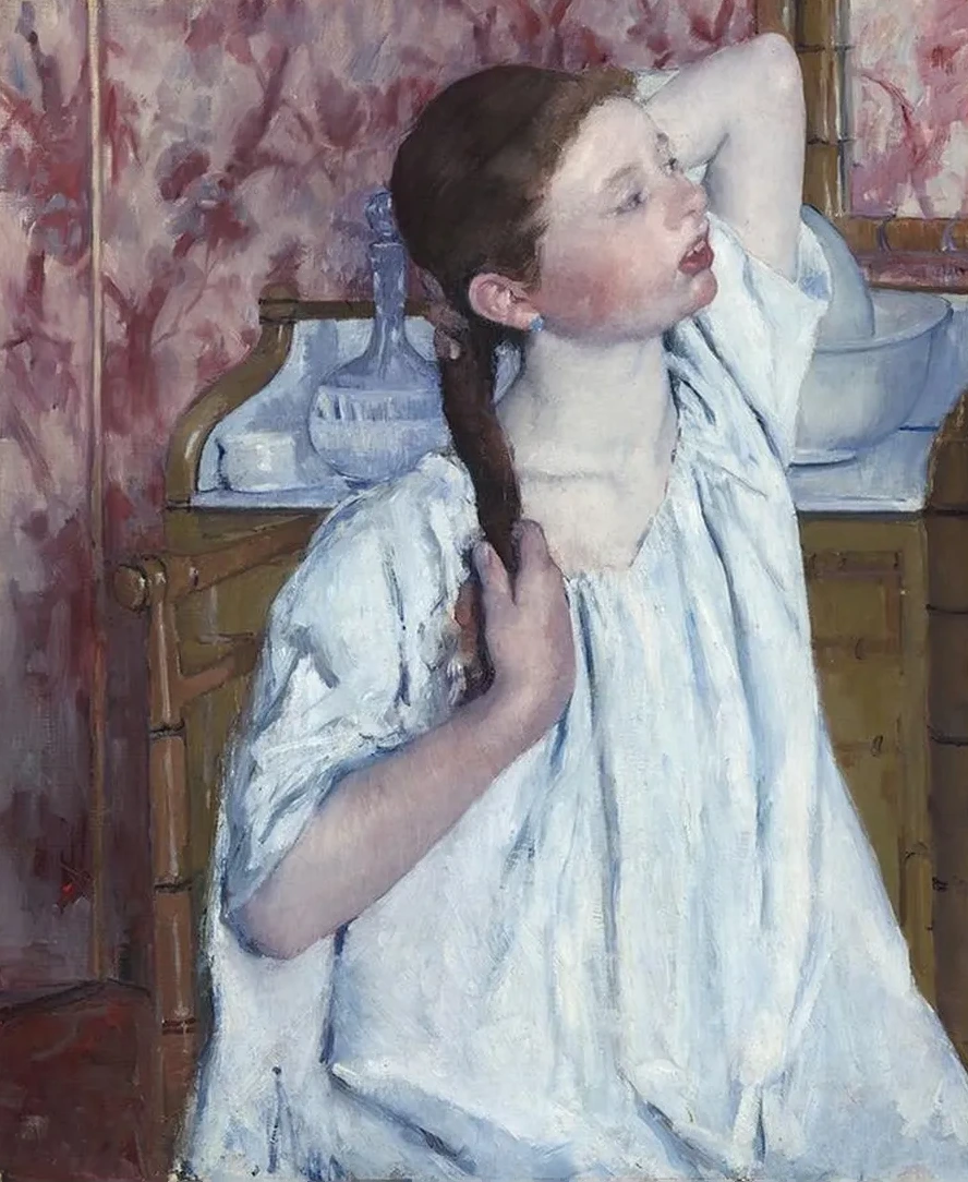 Girl Arranging Her Hair