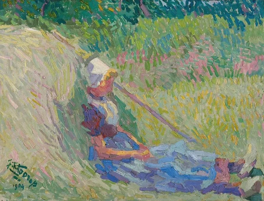 Girl Resting Against a Haystack