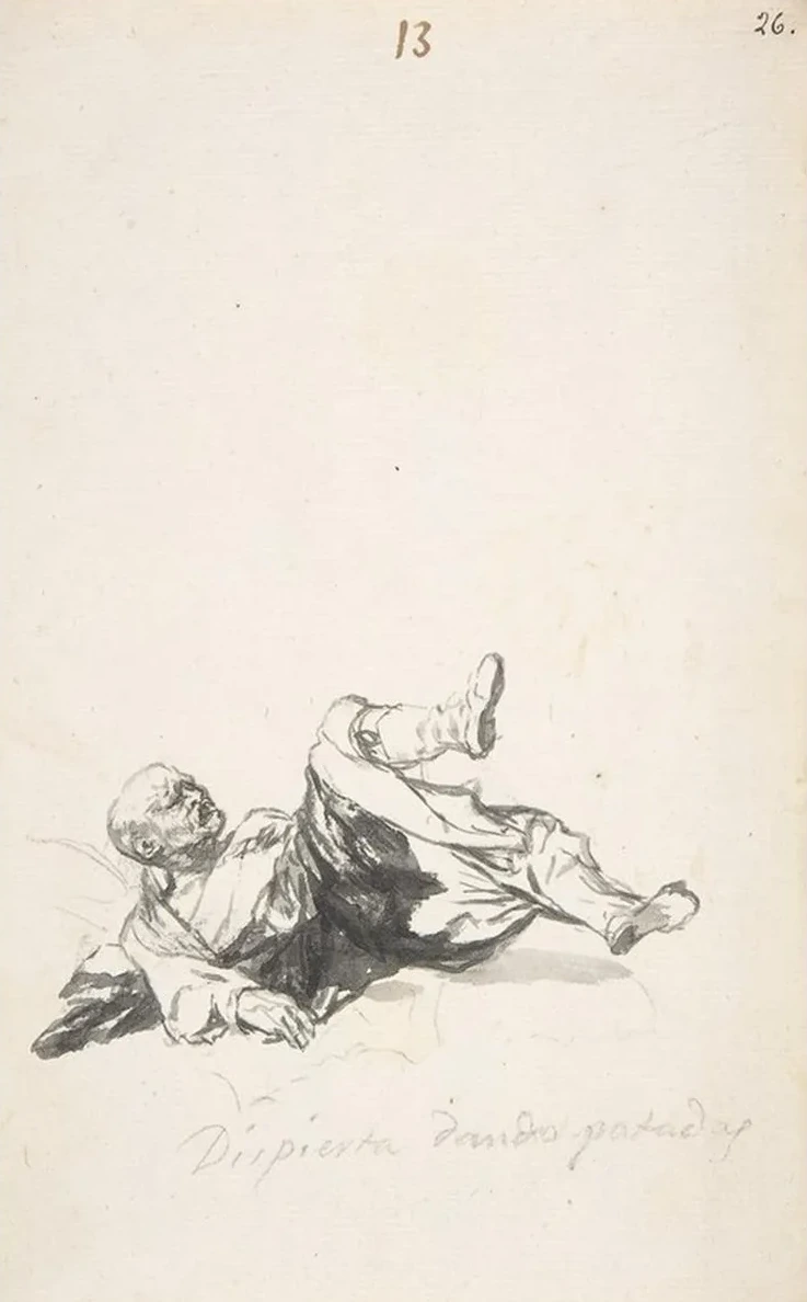He Wakes Up Kicking a Man on the Floor Kicking His Legs After Waking from a Nightmare