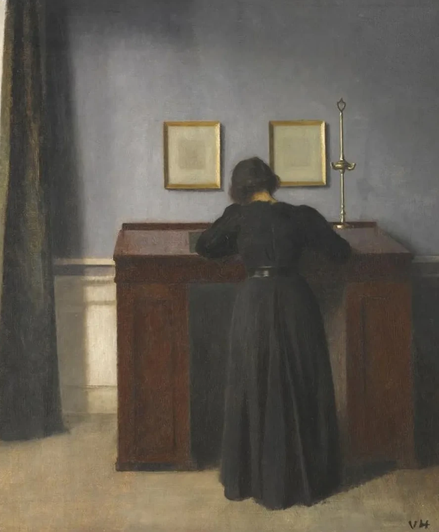Ida Standing At A Desk
