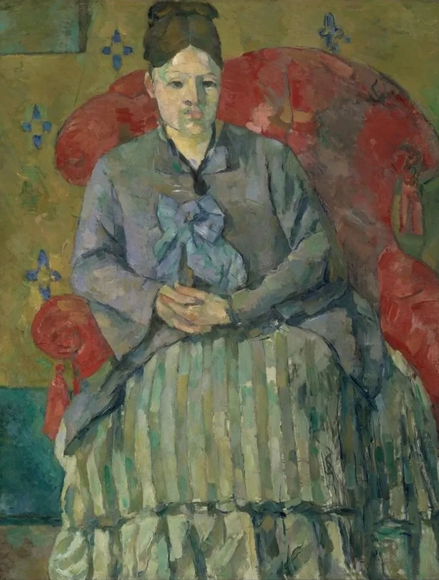 Madame Cezanne in a Red Armchair