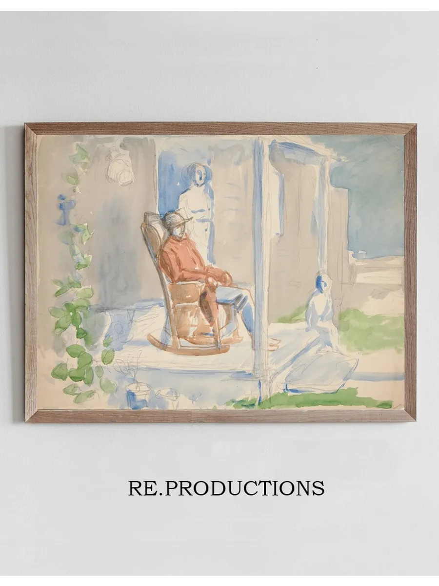 Man in Rocking Chair on Front Porch with His Wife and Child
