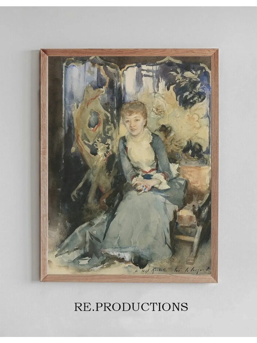 Mrs Reubell Seated In Front Of A Screen