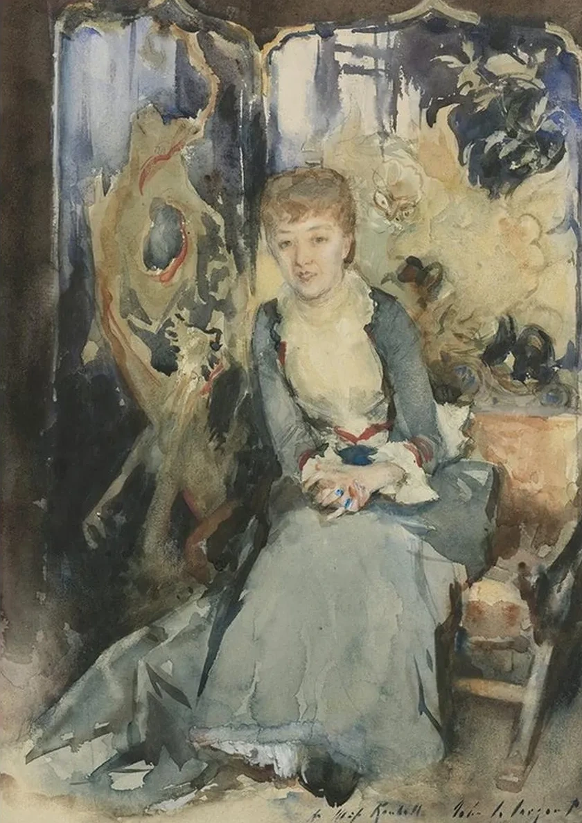 Mrs Reubell Seated In Front Of A Screen