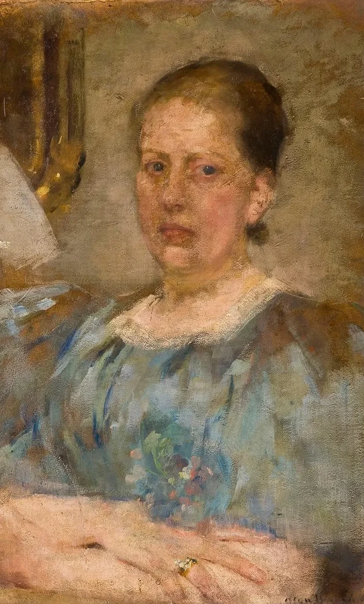 Portrait of a Woman in a Blue Blouse