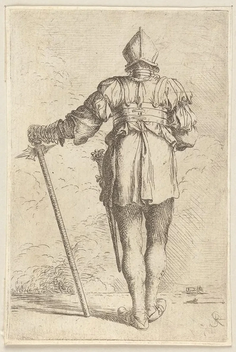 Soldier, Standing, Seen From Behind, in a Helmet, Holding a Cane