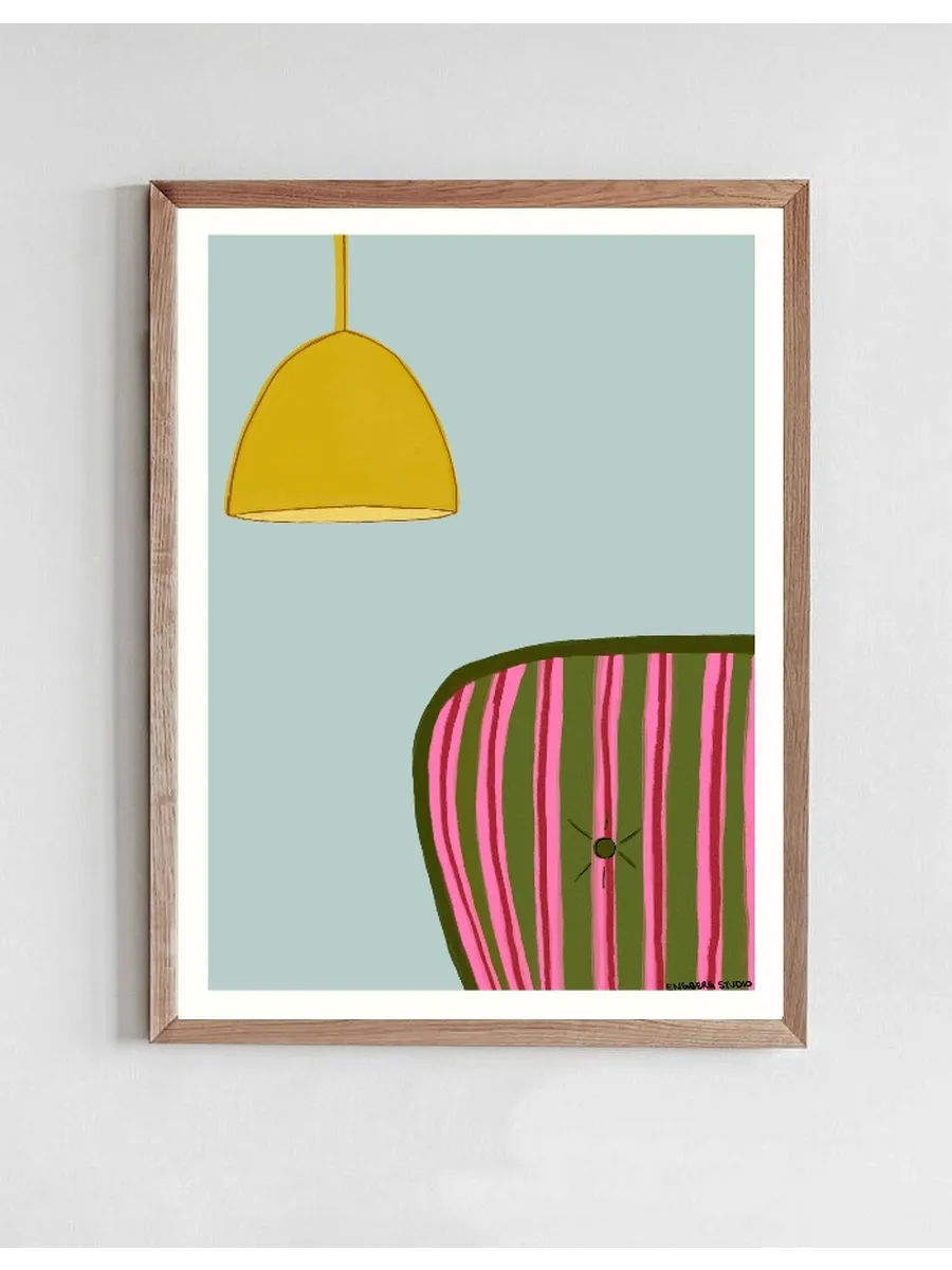 Striped Couch with a Yellow Lamp