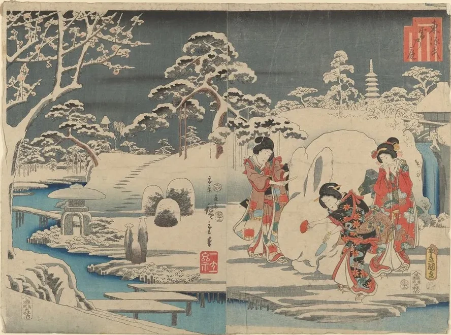 Three Women Making a Snow Rabbit in a Garden