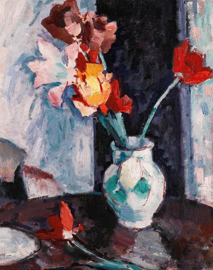 Tulips In A White Vase