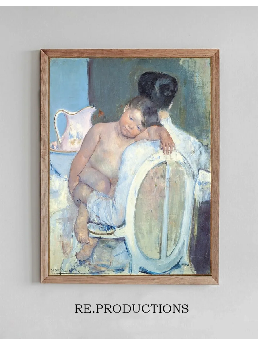 Woman Sitting with a Child in Her Arms