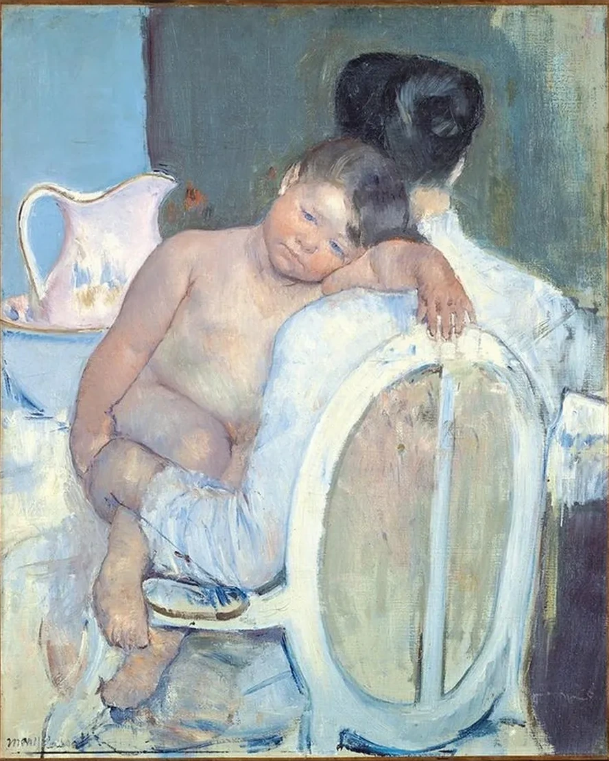 Woman Sitting with a Child in Her Arms