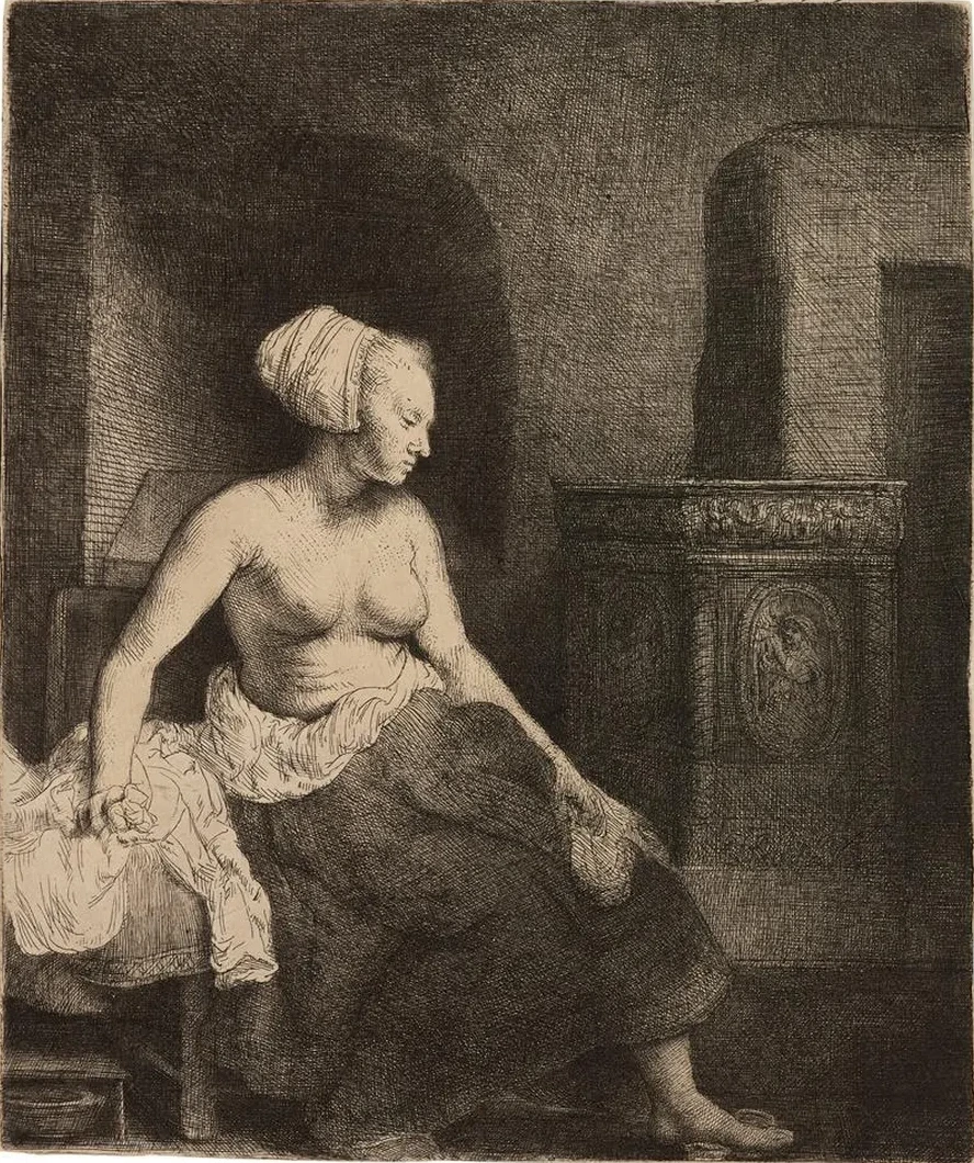 Woman Sitting Half Dressed Beside a Stove