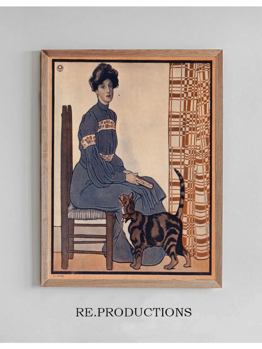 Woman Sitting on a Chair Holding a Book with a Cat Looking on