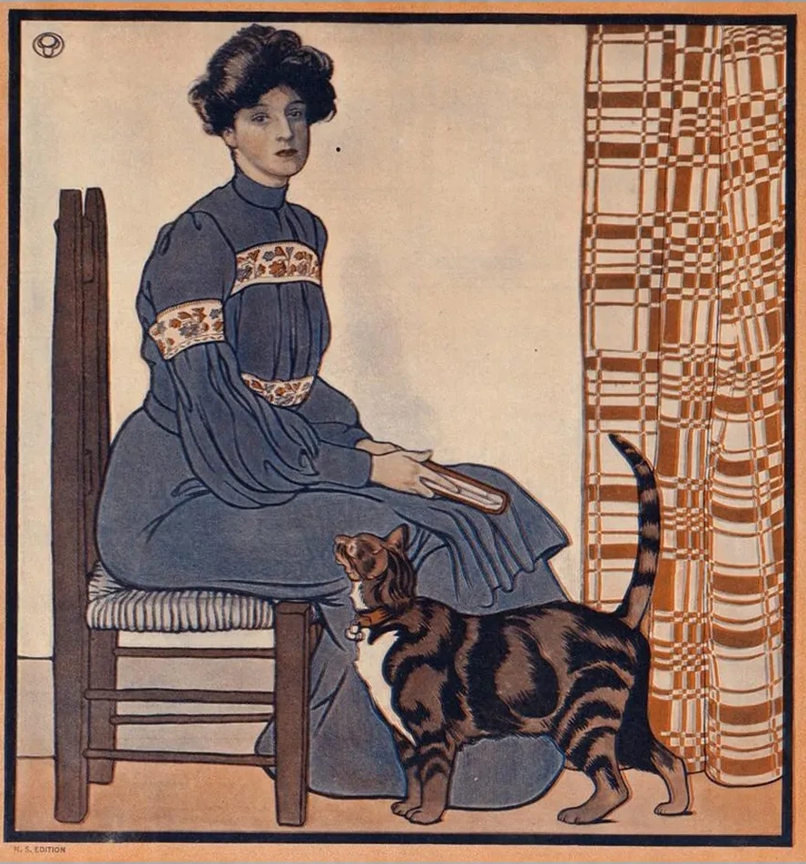 Woman Sitting on a Chair Holding a Book with a Cat Looking on