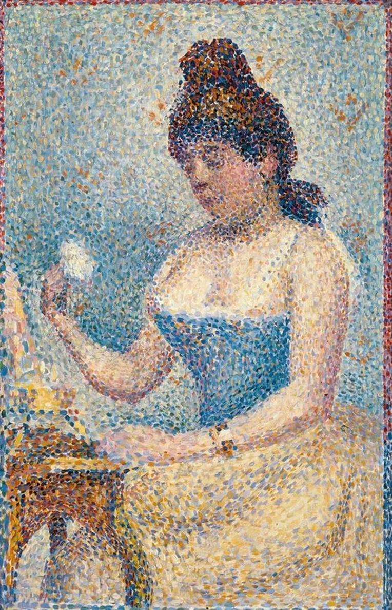 Young Woman Powdering Herself