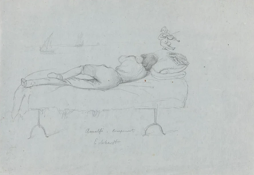 Young Man Lying in Bed
