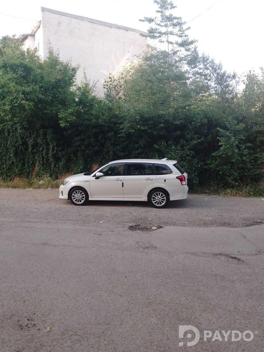 Toyota Corolla Fielder • 2014 г • 1.5 л • Автомат • Универсал • Передний • Гибрид