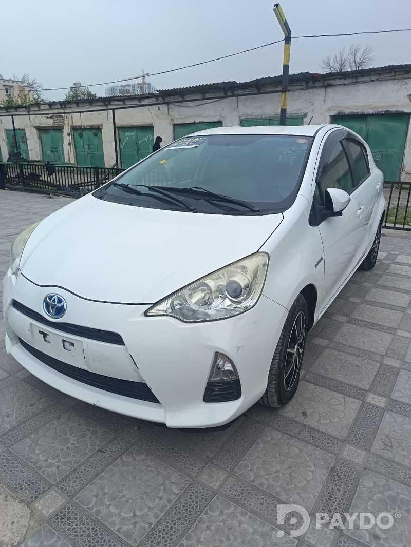 Toyota Aqua • 2014 г • 1.5 л • Автомат • Универсал • Передний • Гибрид
