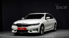 2021 BMW 3-Series 320i Luxury, белый — фото 1